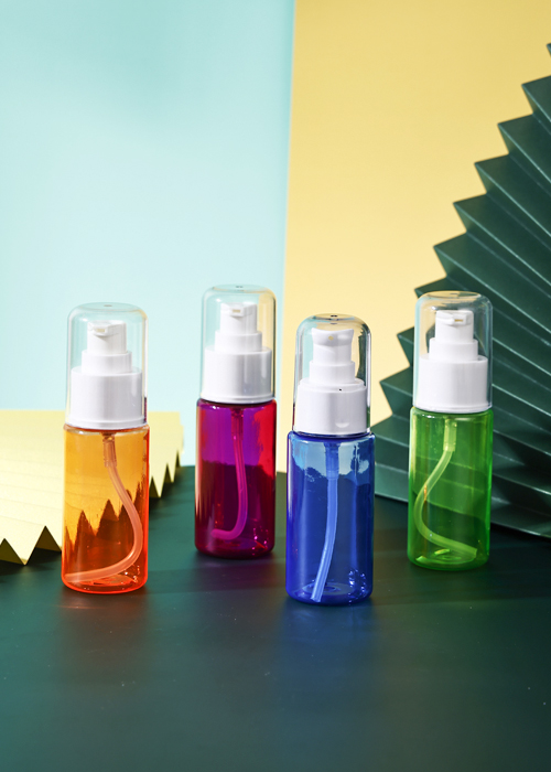 Botella de bomba de loción cilíndrica transparente de color PET de 60 ml